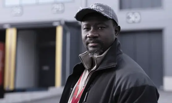 Profile picture of Modou Manneh at the terminal.