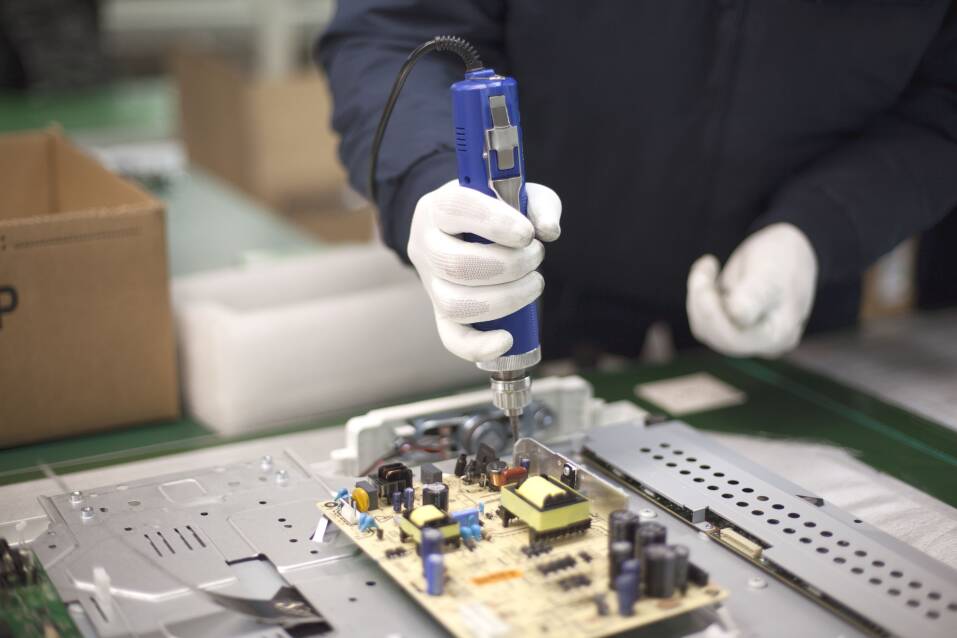 Employee working on products