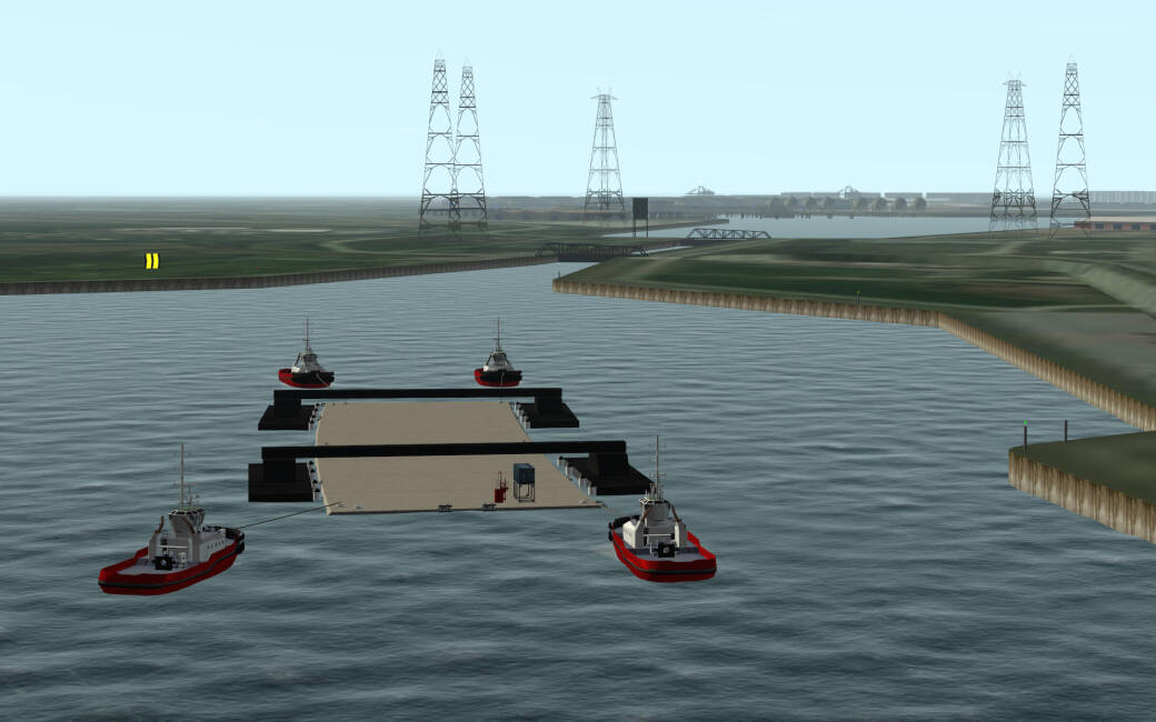 Departure from the Kallo Lock towards the immersion site with the so-called catamaran pontoons attached for the immersion operation. The catamarans are named 'Asterix' and 'Obelix' following a naming contest held in Belgium.