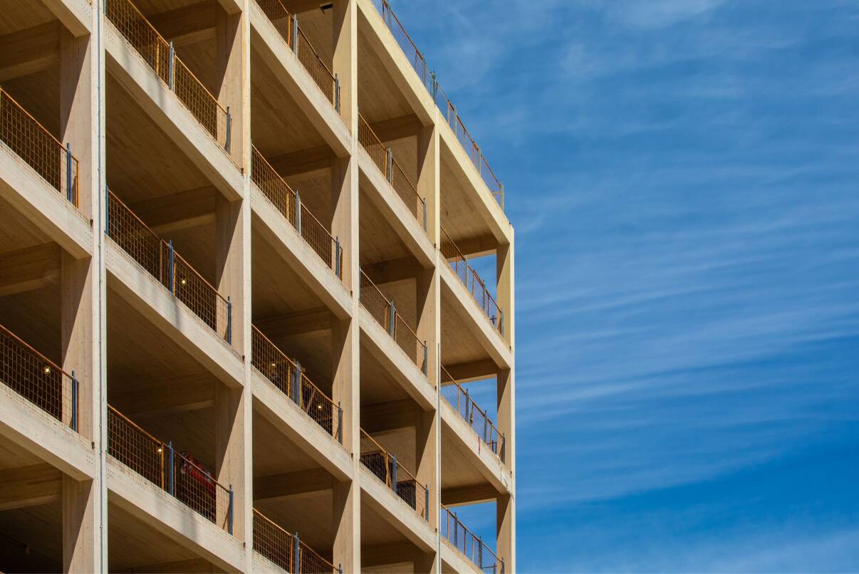 Building framed in wood against a blue sky