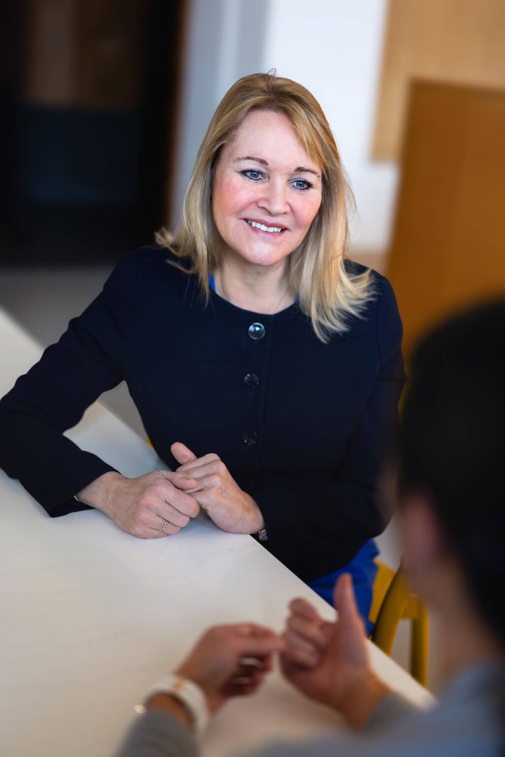 Photo of a female speaker at an event