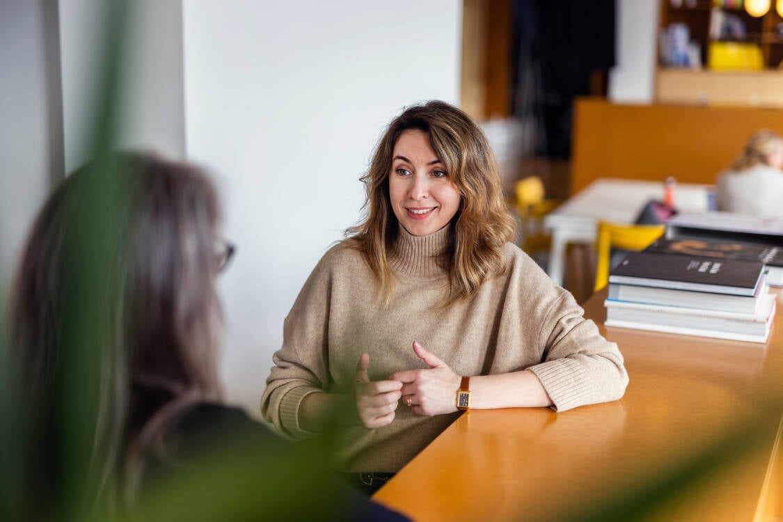 Photo of a female speaker at an event