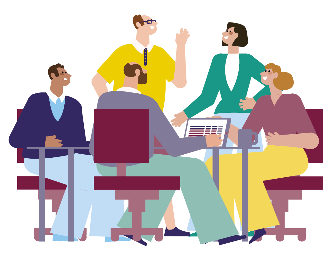 We zien een groep medewerkers in gesprek aan tafel