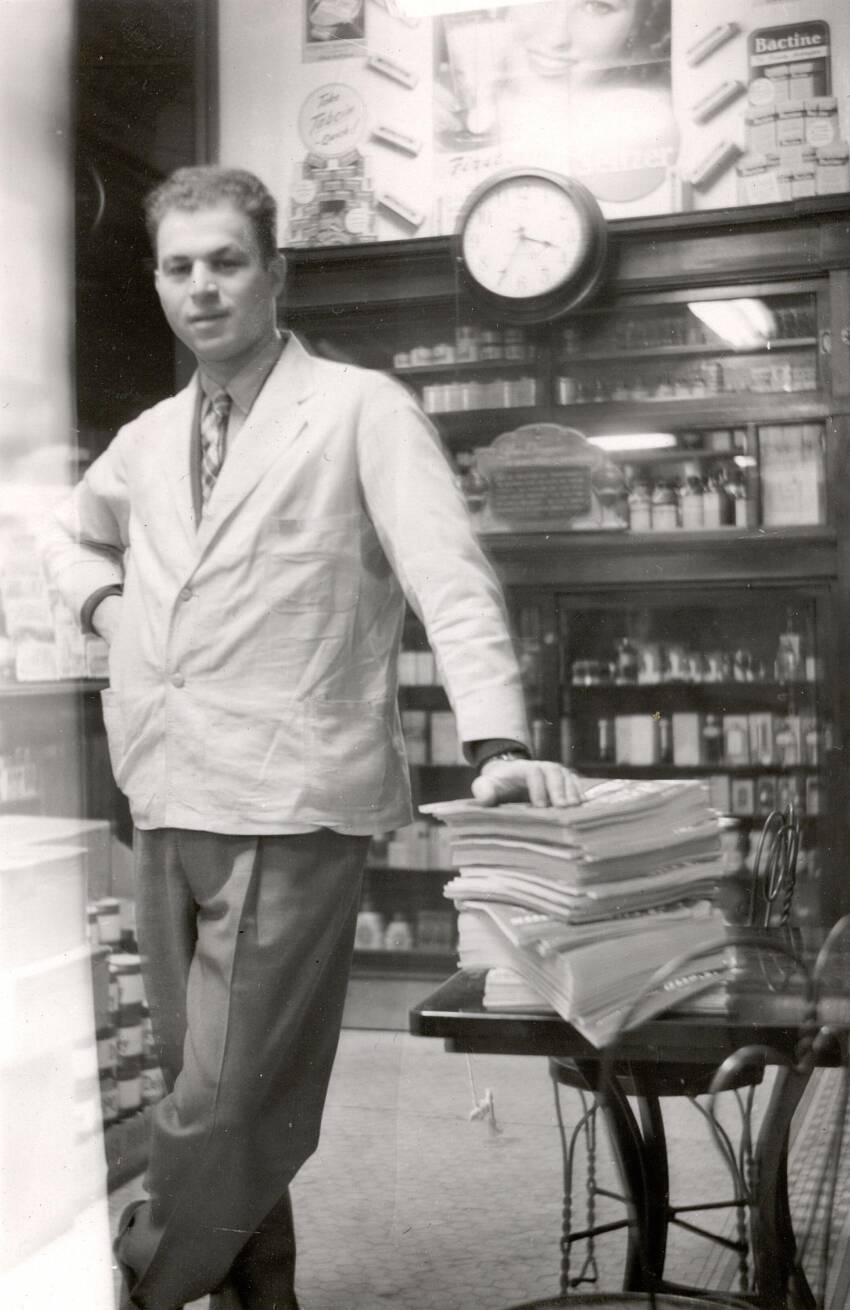 Herb Retzky working at his pharmacy.