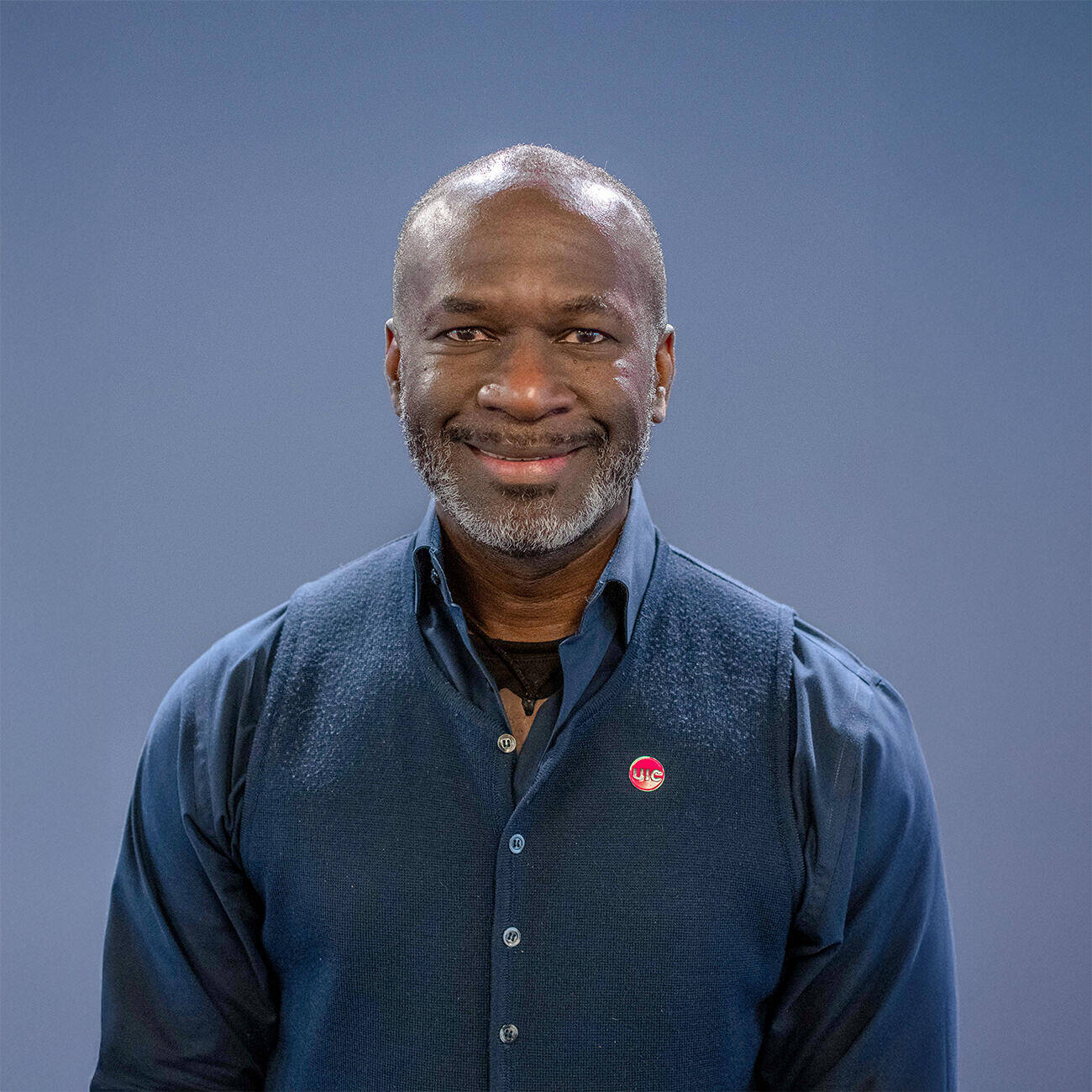UIC alumnus Roddric Sims BA &rsquo;95 in a grey suit.