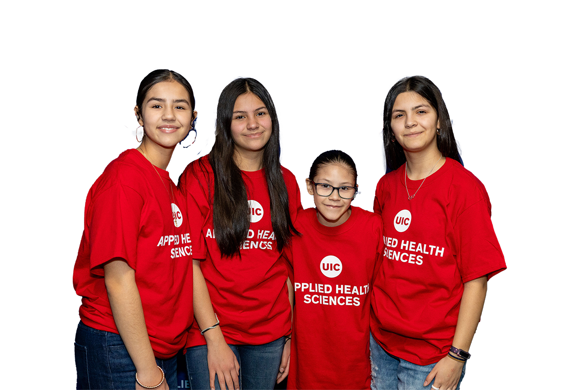 Four UIC students wearing red UIC Applied Health Sciences t-shirts
