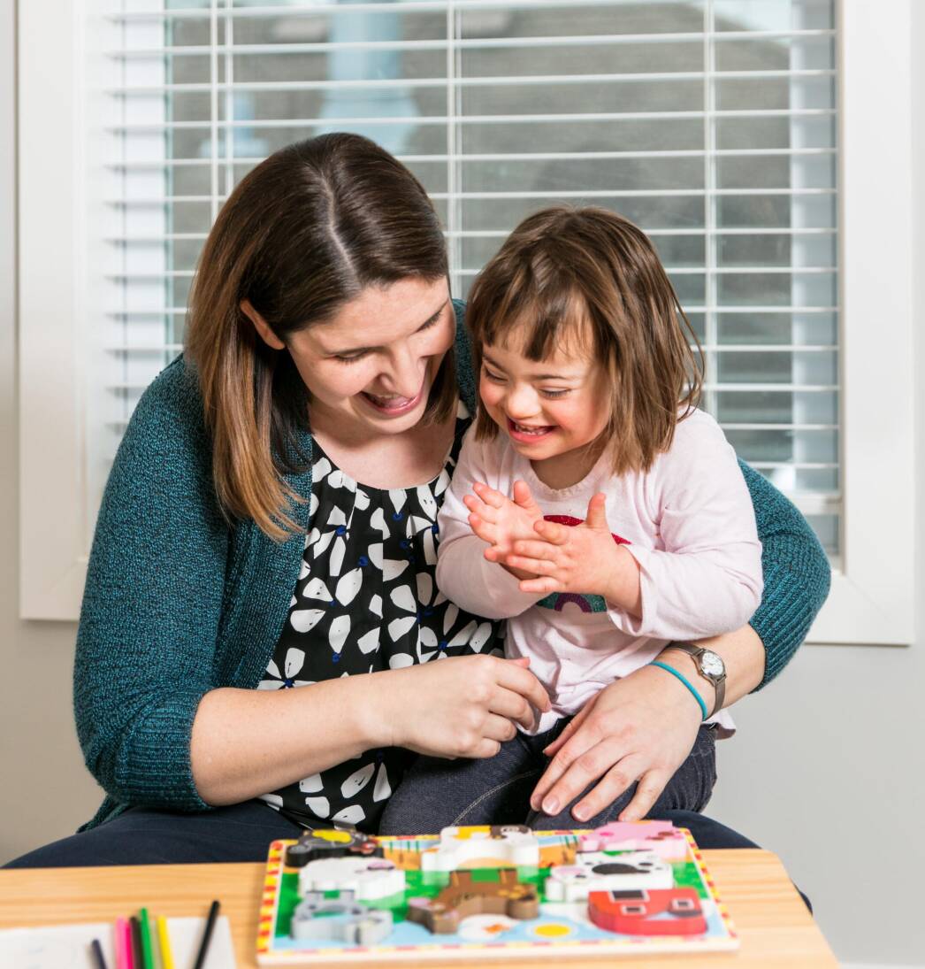 UIC Occupational Therapy faculty member Ashley Stoffel working with a young child