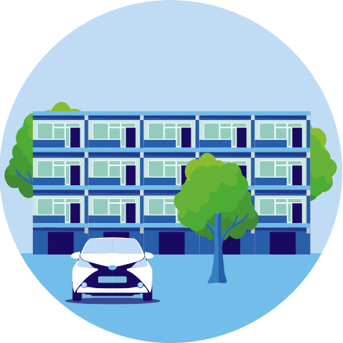 de afbeelding bevat een flatgebouw met op de voorgrond een Tesla