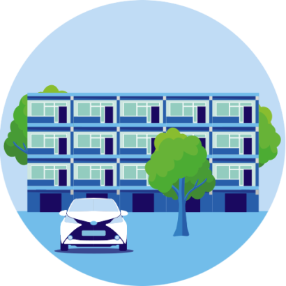 de afbeelding bevat een flatgebouw met op de voorgrond een Tesla