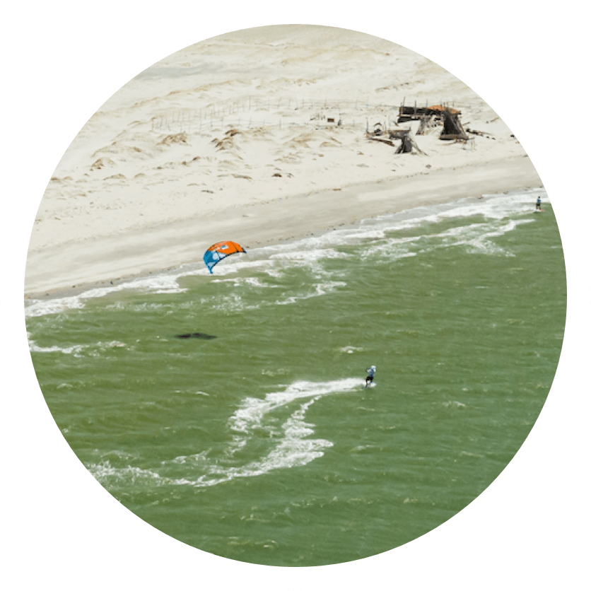 Van oord kite surfer arriving at the beach