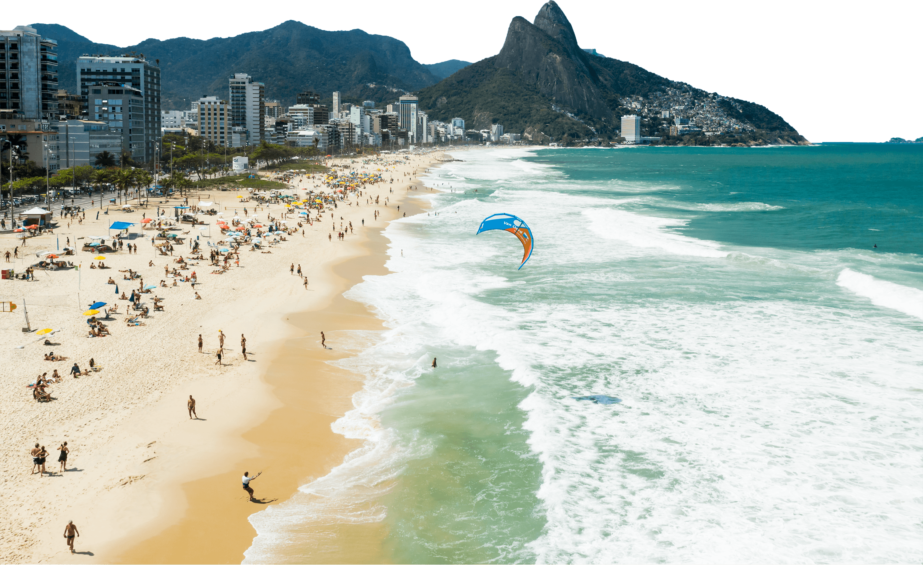 Van oord kitesurfer just landed at a popular tourist beach