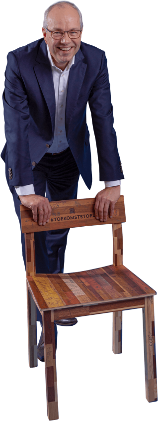 Cutout of CEO Pieter van Oord standing behind a chair